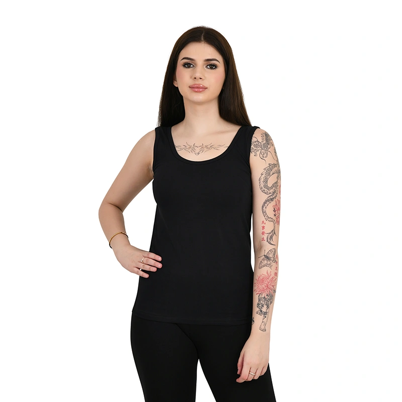 Solid black camisole tank top with black leggings - fashion ecommerce photography by Lohar Studio Delhi